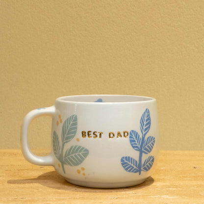 Best Dad - Personalized  gold monogram ceramic mug with "BEST DAD" lettering and floral design.