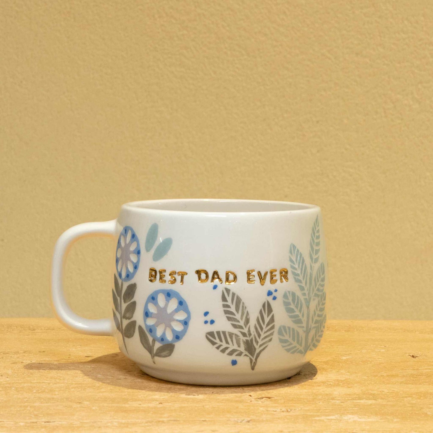 Best Dad personalized gold monogram ceramic mug with floral design.