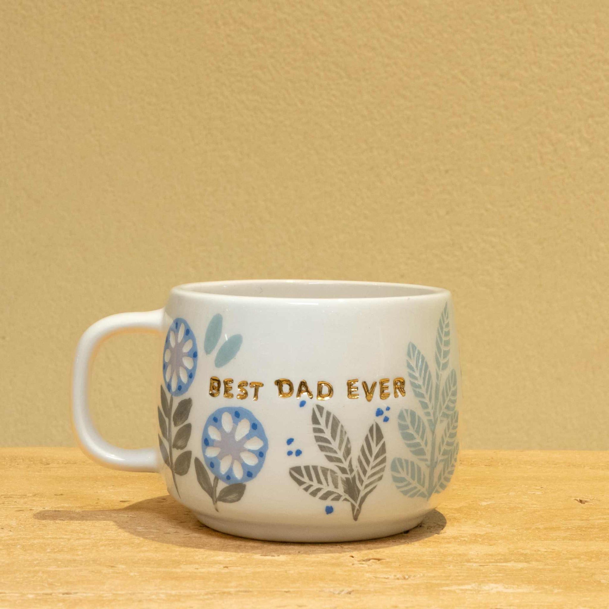 Best Dad personalized gold monogram ceramic mug with floral design.