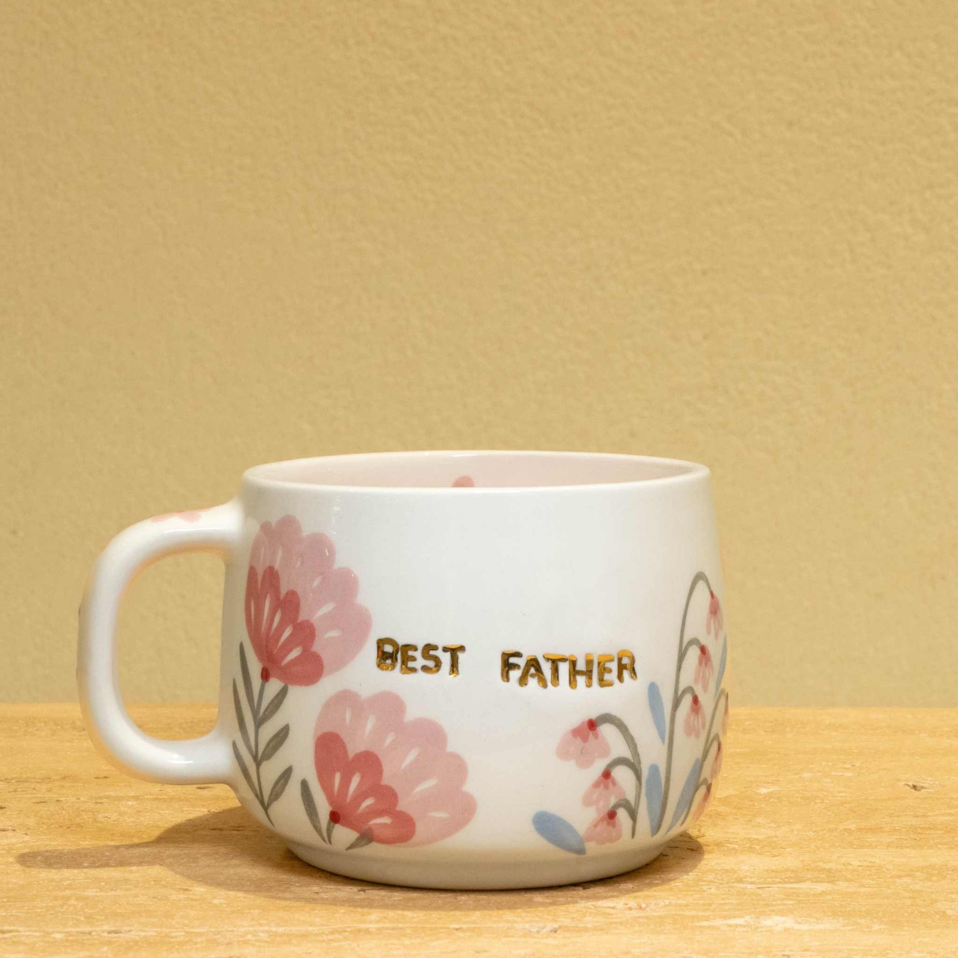 Best Father personalized gold monogram ceramic mug with floral design.