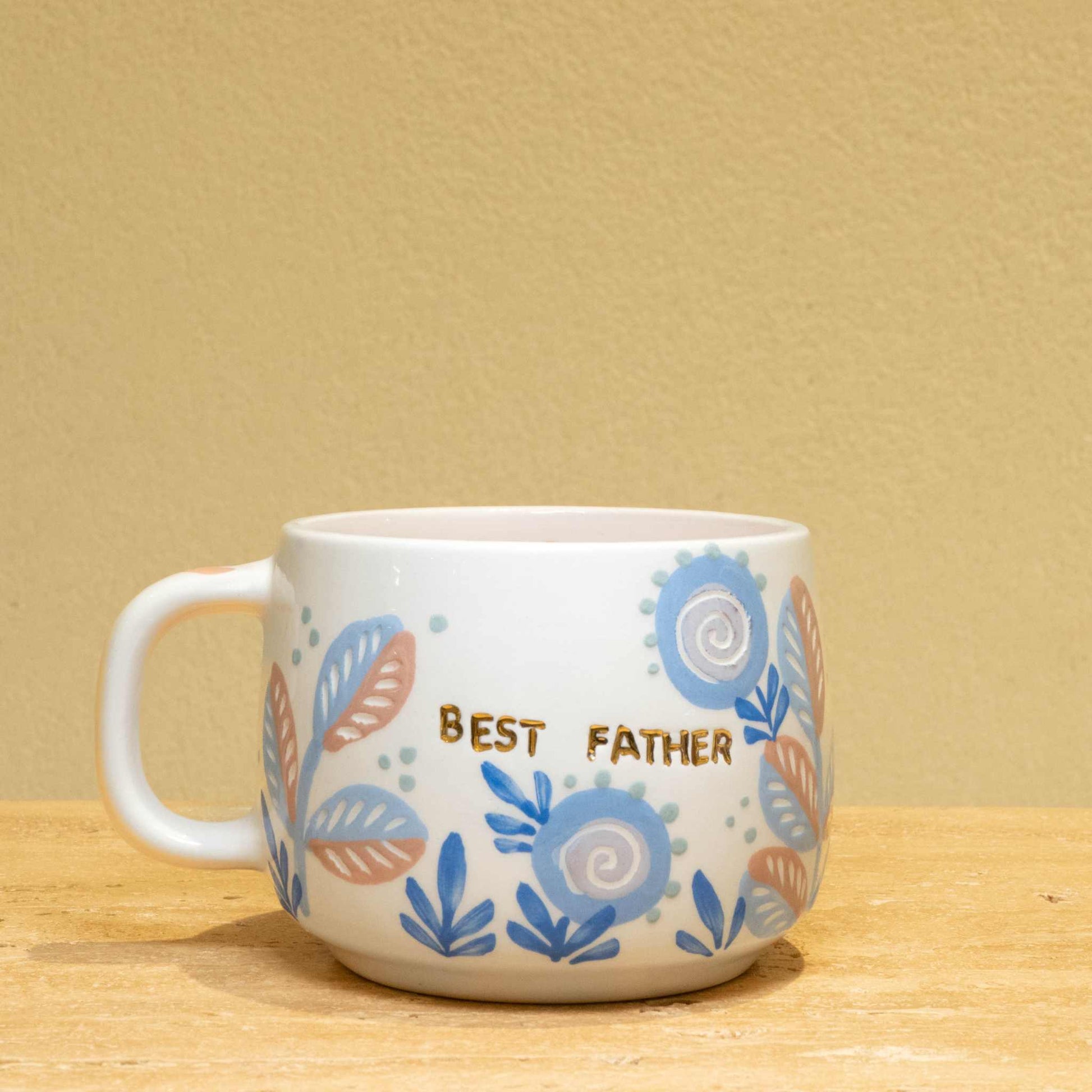Best Father personalized gold monogram ceramic mug with floral design.