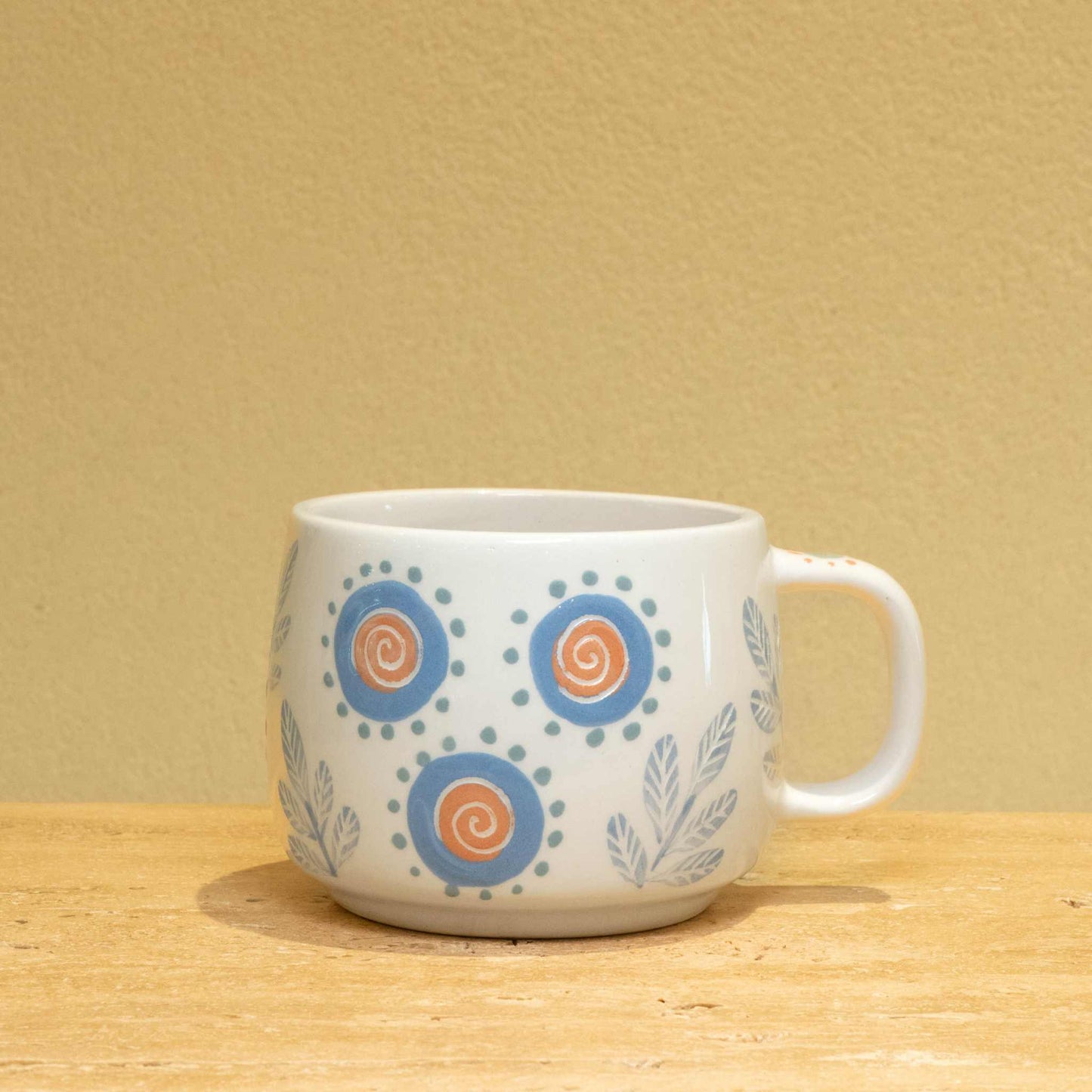 Personalized gold monogram ceramic mug with "Best Son Ever" and floral design.