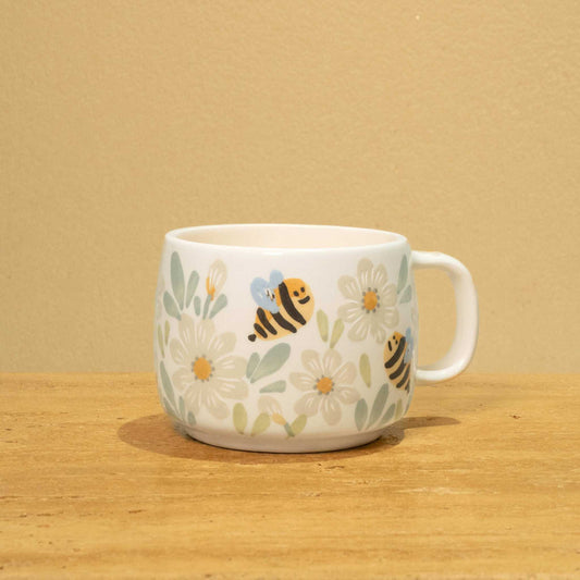 Personalized gold Arabic monogram ceramic mug with floral design for "Best Male Friend".