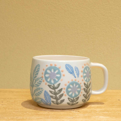 Personalized gold monogram ceramic mug with floral design and "Best Friend Ever" lettering.