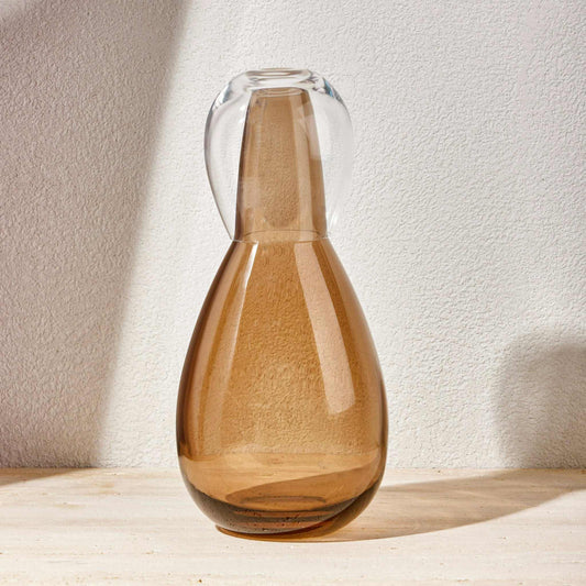 NUDE NIGHT WATER SET 1.5 Litre -BROWNElevate your bedside or tabletop with the NUDE Night Water Set in a rich and sophisticated brown hue. Designed for both style and function, this elegant set includesBottle
