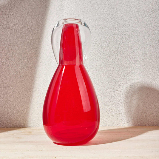 Red water night set with hand-blown glass carafe and matching tumbler lid.