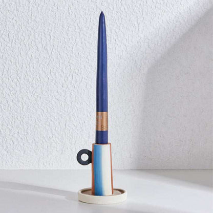 Panama Ceramic Big Straw Candle with multicolor ceramic base and woven straw accent.