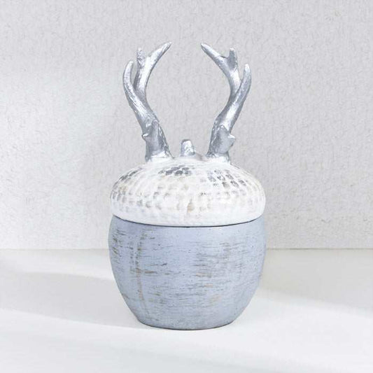 Silver deer horn decoration with weathered base and antler top, rustic charm home accent.