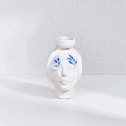 CERAMIC HAND MADE girl face candle holder on white background