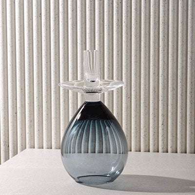 PRINCESS SAMDAN BLUE elegant glass candle holder with blue and clear design.