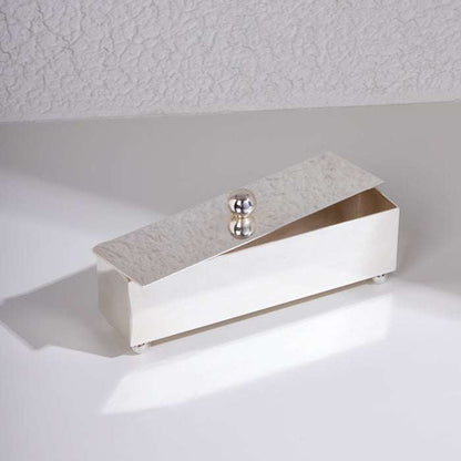 STORAGE SILVER box with a slanted lid and polished spherical handle, perfect for luxury home or office décor.